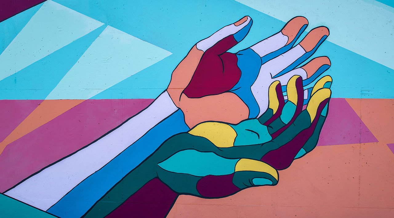 A mural of 2 stylized hands